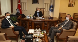 TÜRKİYE ULUSAL AJANSI BAŞKANI İLKER ASTARCI KİÜ REKTÖRÜ PROF. DR. SAMİ ÖZGÜL'Ü ZİYARET ETTİ