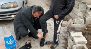 Ülkü Ocakları’ndan bot ve mont yardımı