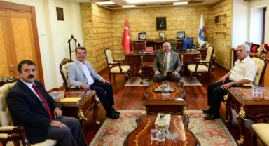Türkoğlu Belediye Başkanı Osman Okumuş’tan Rektör Yasım’a Ziyaret