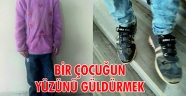 BİR ÇOCUĞUN YÜZÜNÜ GÜLDÜRMEK