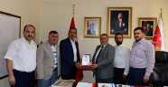 DİN GÖREVLİLERİNDEN BAŞKAN MAHÇİÇEK’E PLAKET