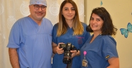 Doğumda çekilen fotoğraftan esinlenerek başladığı iş mesleği oldu