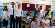 KASKİ’NİN TAŞERON FİRMASINDAN EKİNÖZÜLÜ ÖĞRENCİLERE KİTAP YARDIMI