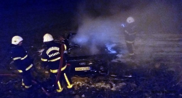 Takla atarak yanan otomobilden baba oğul yara almadan kurtuldu